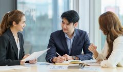 Asian business people planning analyze investment and marketing