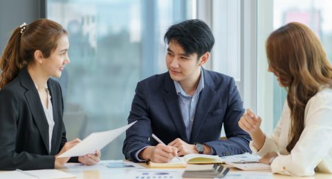 Asian business people planning analyze investment and marketing