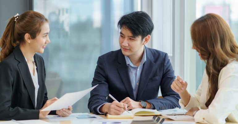 Asian business people planning analyze investment and marketing
