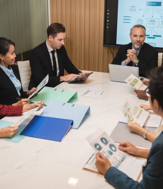 diverse business team leader discuss financial paperwork, Smart businessman and businesswoman
