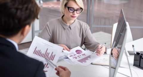 Marketing Director Analyzing Data