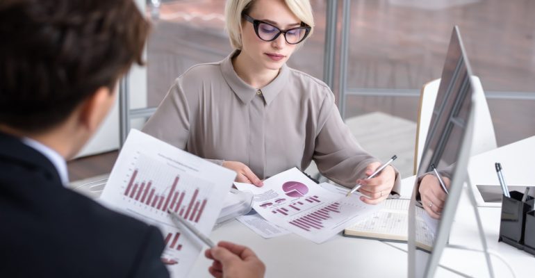 Marketing Director Analyzing Data
