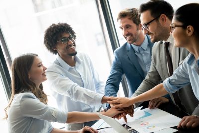 Collaboration and analysis by business people working in office