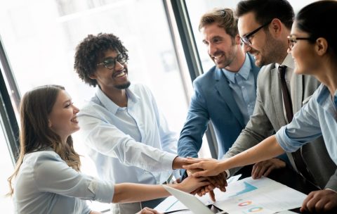 Collaboration and analysis by business people working in office
